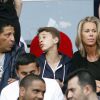 Smaïn, sa compagne Sid et son fils Rayanne lors du match Psg-Montpellier au Parc des Princes à Paris, le 17 mai 2014