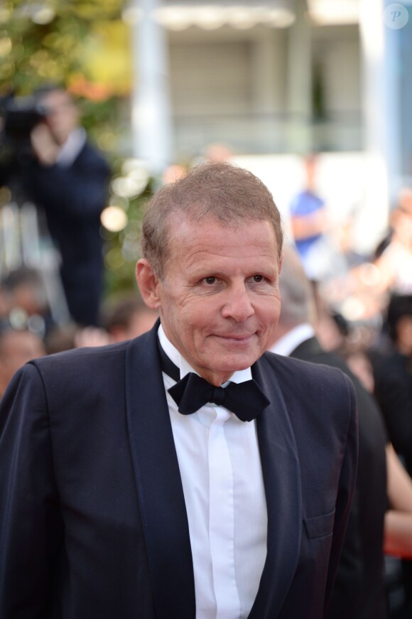 Patrick Poivre d'Arvor lors de la montée des marches de The Homesman à l'occasion du 67e Festival de Cannes, le 18 mai 2014.