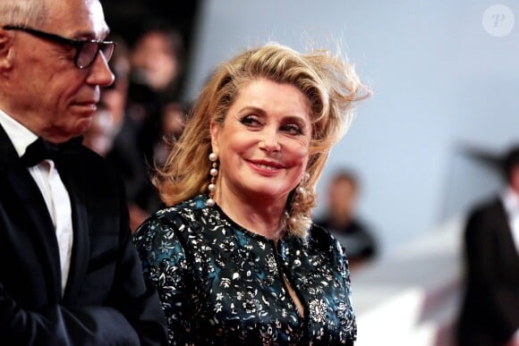 Catherine Deneuve - Montée des marches du film "L'homme qu'on aimait trop" lors du 67e Festival du film de Cannes le 21 mai 2014.