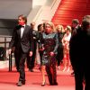 Benjamin Biolay et Catherine Deneuve - Descente des marches du film "L'homme qu'on aimait trop" lors du 67e Festival du film de Cannes le 21 mai 2014.