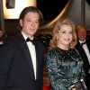 Benjamin Biolay et Catherine Deneuve - Descente des marches du film "L'homme qu'on aimait trop" lors du 67e Festival du film de Cannes le 21 mai 2014.