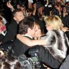 Sharon Stone, John Travolta et Kelly Preston pour une instant de complicité au milieu des photographes à la soirée Roberto Cavalli sur son yacht sur le port de Cannes lors du 67e Festival de Cannes le 21 mai 2014.
