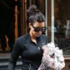 Kim Kardashian quitte la salle de gym à Paris le 22 mai 2014.