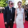 Uma Thurman et Quentin Tarantino à la montée des marches de la cérémonie de clôture du 67e Festival du film de Cannes le 24 mai 2014.