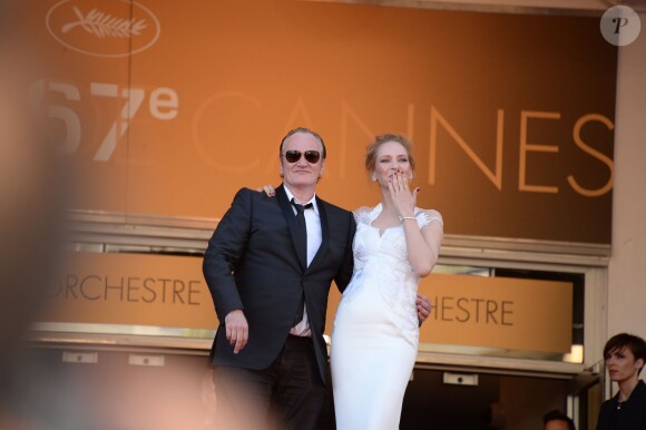 Quentin Tarantino, Uma Thurman lors de la montée des marches pour la cérémonie de clôture du 67e Festival de Cannes, le 24 mai 2014.
