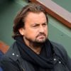 Henri Leconte dans les tribunes de Roland-Garros à Paris, le 31 mai 2013