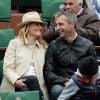 Astrid Bard et Yann Delaigue lors du quatrième jour des Internationaux de France à Roland-Garros, le 28 mai 2014 à Paris
