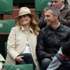 Astrid Bard et Yann Delaigue, futurs parents heureux lors du quatrième jour des Internationaux de France à Roland-Garros, le 28 mai 2014 à Paris