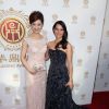 Olivia Xu et Lucy Liu lors de la 11e cérémonie des Huading Film Awards au Ricardo Montalban Theater de Los Angeles, le 1er juin 2014.