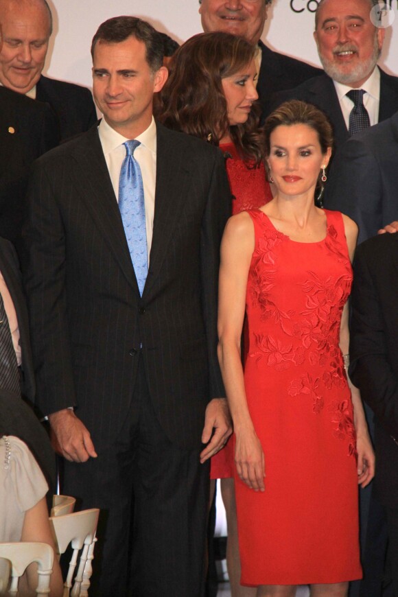 La princesse Letizia et le prince Felipe d'Espagne assistent à un dîner organisé par la Chambre de Commerce à Séville, en Espagne, le 20 mai 2014.