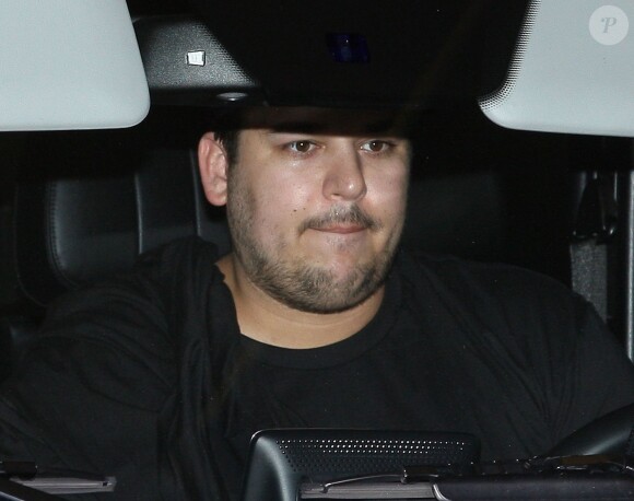 Rob Kardashian arrive à l'aéroport de LAX à Los Angeles. Rob n'a pas assisté au mariage de sa soeur Kim Kardashian et de Kanye West. Le 24 mai 2014