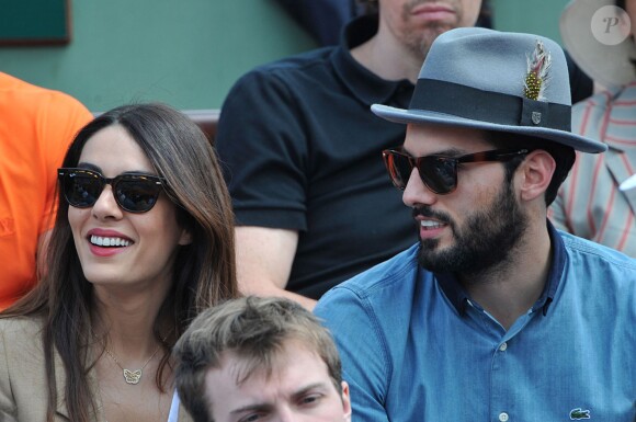 Sofia Essaïdi et son compagnon Adrien Galo aux Internationaux de France de tennis de Roland-Garros à Paris, le 5 juin 2014.