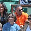 Amel Bent et son ami avec Sofia Essaïdi et son compagnon lors des Internationaux de France de tennis de Roland-Garros à Paris, le 5 juin 2014.