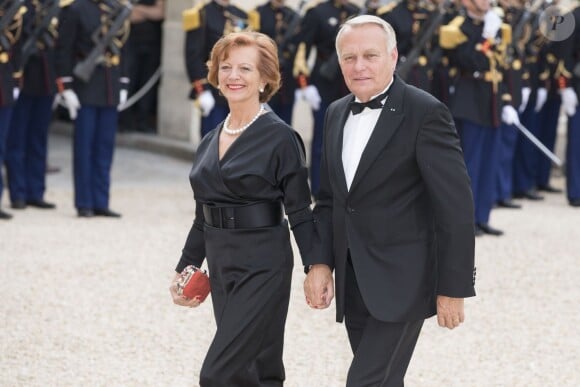 Jean-Marc Ayrault et sa femme Brigitte Ayrault lors du banquet à l'Elysée donné en l'honneur de la reine Elizabeth II, Paris, le 6 juin 2014.