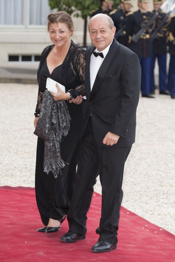 Jean-Yves Le Drian et sa femme lors du banquet à l'Elysée donné en l'honneur de la reine Elizabeth II, Paris, le 6 juin 2014.