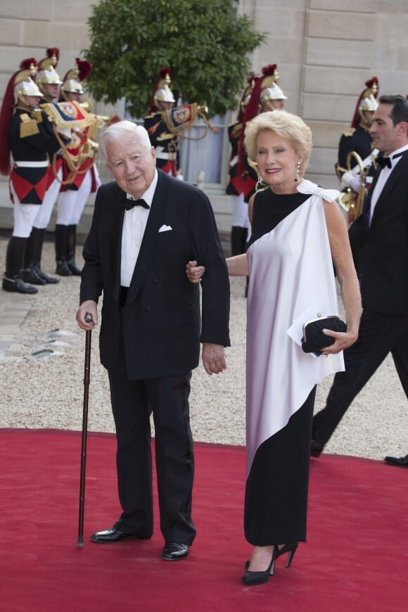 Jean-Bernard Raimond et sa femme Monique Raimond lors du banquet à l'Elysée donné en l'honneur de la reine Elizabeth II, Paris, le 6 juin 2014.