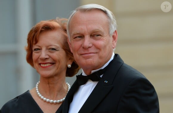 Jean-Marc Ayrault et Brigitte Ayrault lors du banquet à l'Elysée donné en l'honneur de la reine Elizabeth II, Paris, le 6 juin 2014.