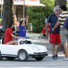 Flavio Briatore, ému au côté d'Elisabetta Gregoraci de voir son fils Nathan Falco prendre le volant d'une voiture de course dans les rues de Marina di Pietrasanta, le 7 juin 2014