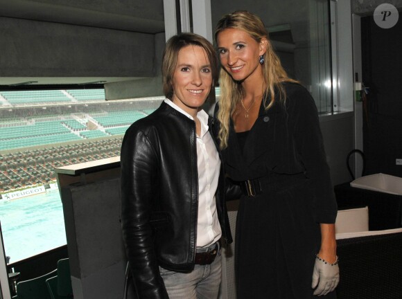 Justine Hénin et Tatiana Golovin lors des internationaux de France à Roland-Garros à Paris, le 7 juin 2012