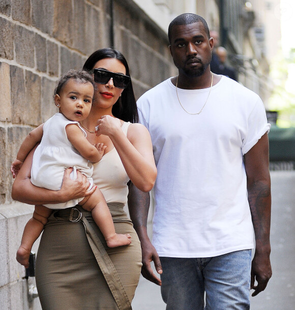 Kim Kardashian, Kanye West et leur fille North West à New York. Le 15 juin 2014.