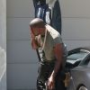Kanye West rentre chez lui à Los Angeles, le 22 juin 2014.
