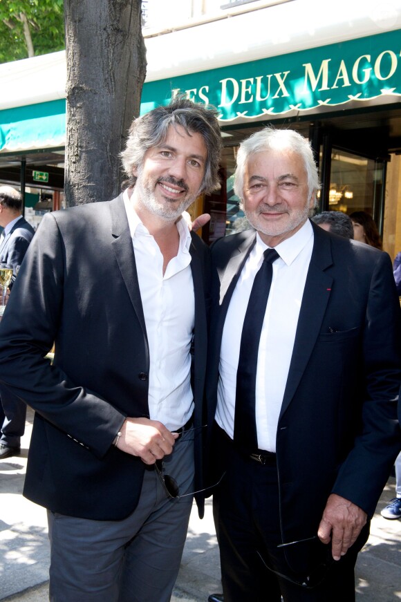 Franck Provost et son fils Fabien lors du déjeuner Père & Fils, mardi 24 juin 2014, aux Deux Magots à Paris.