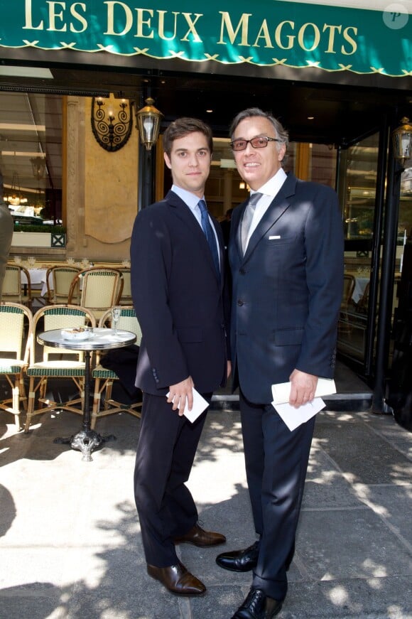 François Delahaye et son fils Nicolas lors du déjeuner Père & Fils, mardi 24 juin 2014, aux Deux Magots à Paris.