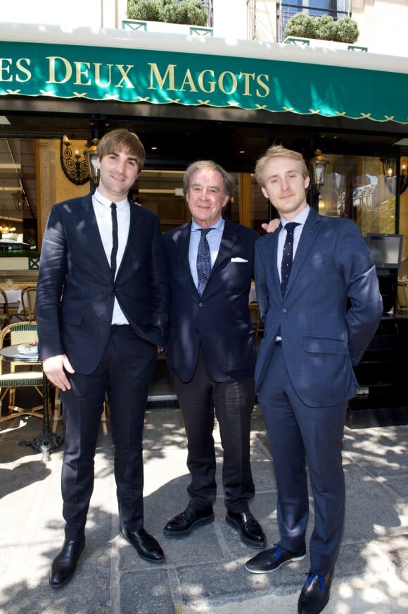 L'architecte Jean-Michel Wilmotte et ses fils Nelson et Harold lors du déjeuner Père & Fils, mardi 24 juin 2014, aux Deux Magots à Paris.