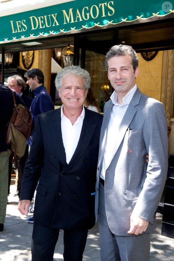 Laurent Dassault et son fils Julien lors du déjeuner Père & Fils, mardi 24 juin 2014, aux Deux Magots à Paris.