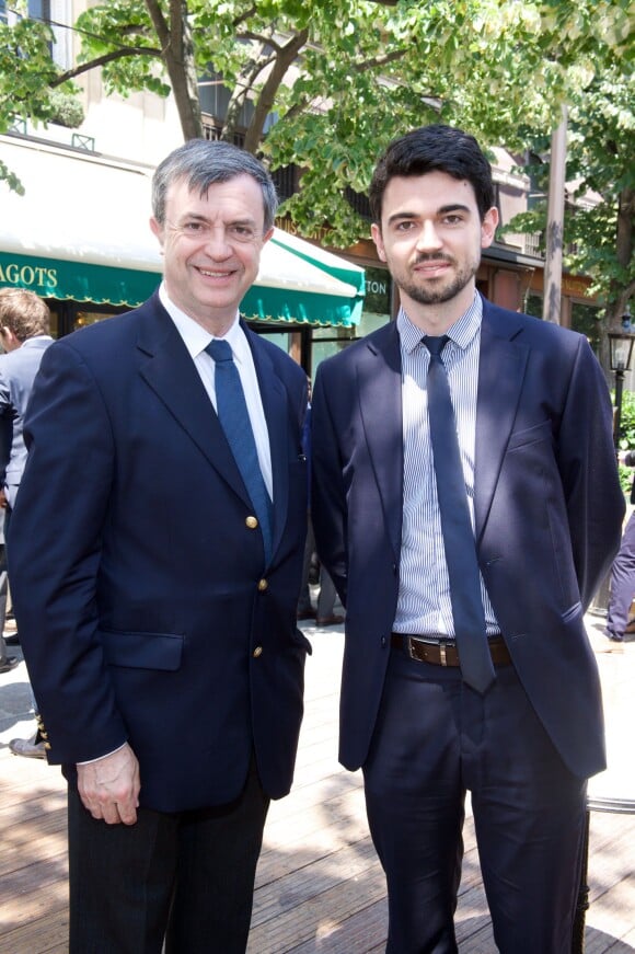 Jean-Pierre Lecoq et son fils lors du déjeuner Père & Fils, mardi 24 juin 2014, aux Deux Magots à Paris.