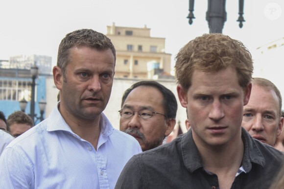 Le prince Harry en visite à Cracolandia (un quartier de Sao Paulo réputé pour ses nombreux consommateurs de crack) le 26 juin 2014.