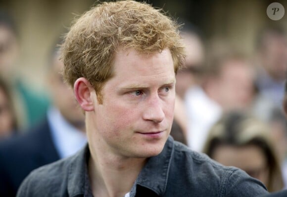 Le prince Harry en visite à Cracolandia (un quartier de Sao Paulo réputé pour ses nombreux consommateurs de crack) le 26 juin 2014.