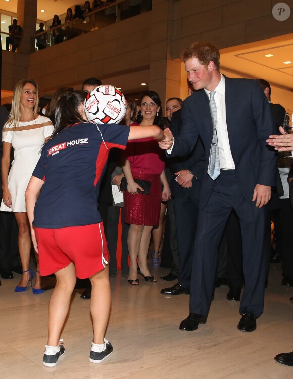 Prince Harry lors d'une réception donnée à Sao Paulo, au Brésil le 25 juin 2014.