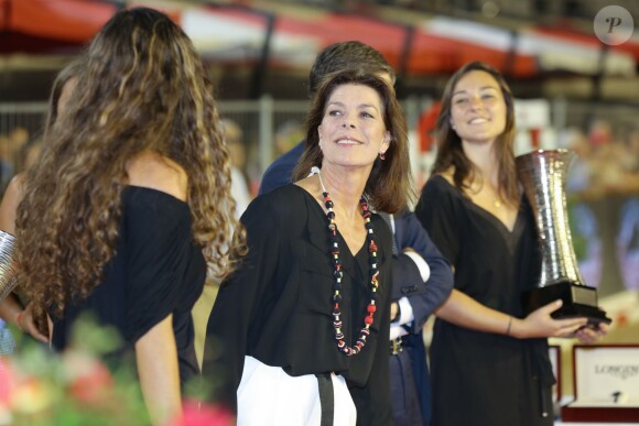 La princesse Caroline de Hanovre très fière de la victoire de sa fille Charlotte Casiraghi qui remporte la Longines Pro-Am Cup du Jumping international de Monaco, le 27 juin 2014.