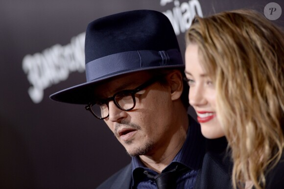 Johnny Depp et Amber Heard à Los Angeles, le 12 février 2014.