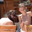  Andrea Pirlo sur une plage &agrave; Ibiza avec ses enfants Niccolo (10 ans) et Angela (6 ans) le 6 Juillet 2014. 