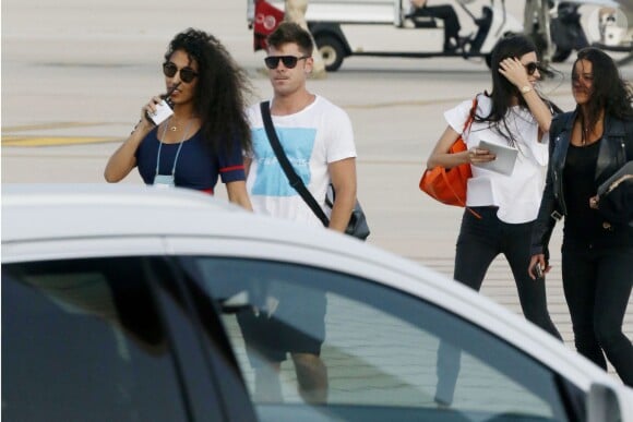 Zac Efron et Michelle Rodriguez à l'aéroport en Sardaigne, 3 juillet 2014