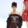 Kendall Jenner défile pour Chanel lors du show haute couture automne-hiver 2014-2015 au Grand Palais. Paris, le 8 juillet 2014.