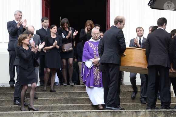 Emotion aux obsèques de Benoît Duquesne, à l'église Jeanne d'Arc de Versailles, le jeudi 10 juillet 2014.
