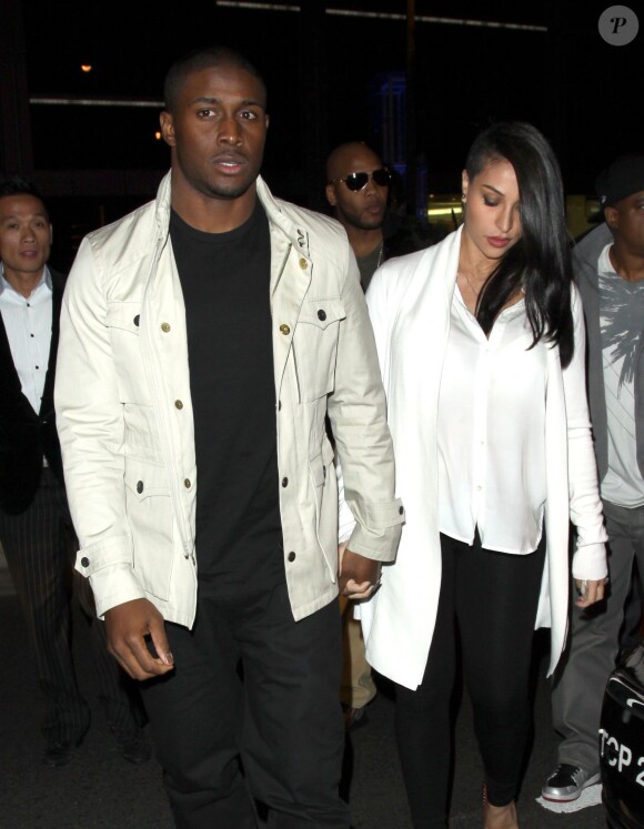 Reggie Bush (ex-boyfriend Kim Kardashian) et Lilit Avagyan (enceinte) sortent d' un Night Club à Los Angeles, le 13 février 2013.