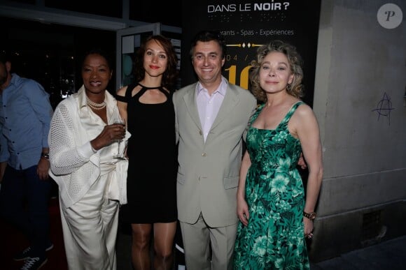 Babette de Rozières, Grace de Capitani, Edouard de Broglie et son épouse Aliona lors de la soirée anniversaire des 10 ans du restaurant "Dans Le Noir" à Paris, le 14 juillet 2014.