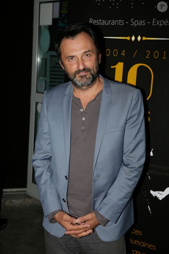 Frédéric Lopez lors de la soirée anniversaire des 10 ans du restaurant "Dans Le Noir" à Paris, le 14 juillet 2014.