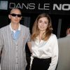 Julie Gayet et son ami Grégory Richard de La Tour lors de la soirée anniversaire des 10 ans du restaurant "Dans Le Noir" à Paris, le 14 juillet 2014.