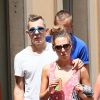 Lucas Digne et sa compagne Tiziri dans les rues de Saint-Tropez, le 12 juillet 2014