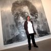 Yan Pei-Ming devant son oeuvre, un portrait de Giacometti - Vernissage de l'exposition "ArtLovers - Histoires d'art dans la collection Pinault" au Grimaldi Forum le 15 juillet 2014.