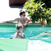 Lea Michele en bikini au bord de la piscine à Los Angeles, le 16 juillet 2014.