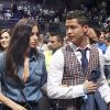 Cristiano Ronaldo et sa compagne Irina Shayk assistent à un match de basket à Madrid, le 20 mars 2014.