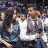 Cristiano Ronaldo et sa compagne Irina Shayk assistent à un match de basket à Madrid, le 20 mars 2014.