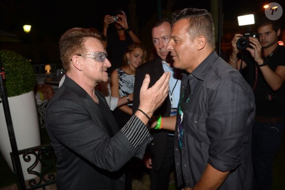 Exclusif - Bono et Jean-Roch au VIP Room à Saint-Tropez, le 23 juillet 2014.