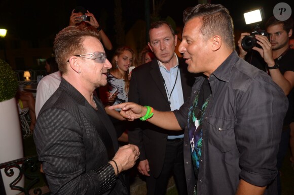 Exclusif - Bono et Jean-Roch au VIP Room à Saint-Tropez, le 23 juillet 2014.